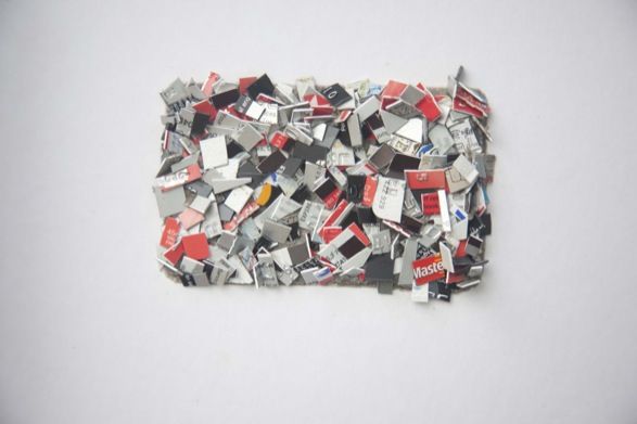 <i>Credit Crunch</i>, cut up credit cards, 85 x 53mm. Photo: Aled Rhys Huws