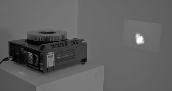 <i>The air we breathe</i> Installation with slide projector, slides, sound, 2011