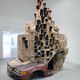 A Permeable Body of Solitude, 2012, 3,5 x 3 x 4 meters, cardboard, glass, plexieglass, car-piece and epoxy. Courtesy Upstream Gallery 